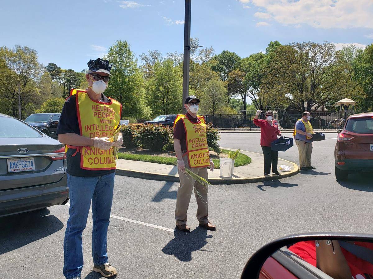 More than 400 cars took part, stretching all the way down to Jackson Street from the church parking lot. People were encouraged to wear red and bring items to be donated to those in need during the pandemic. (Photo provided)