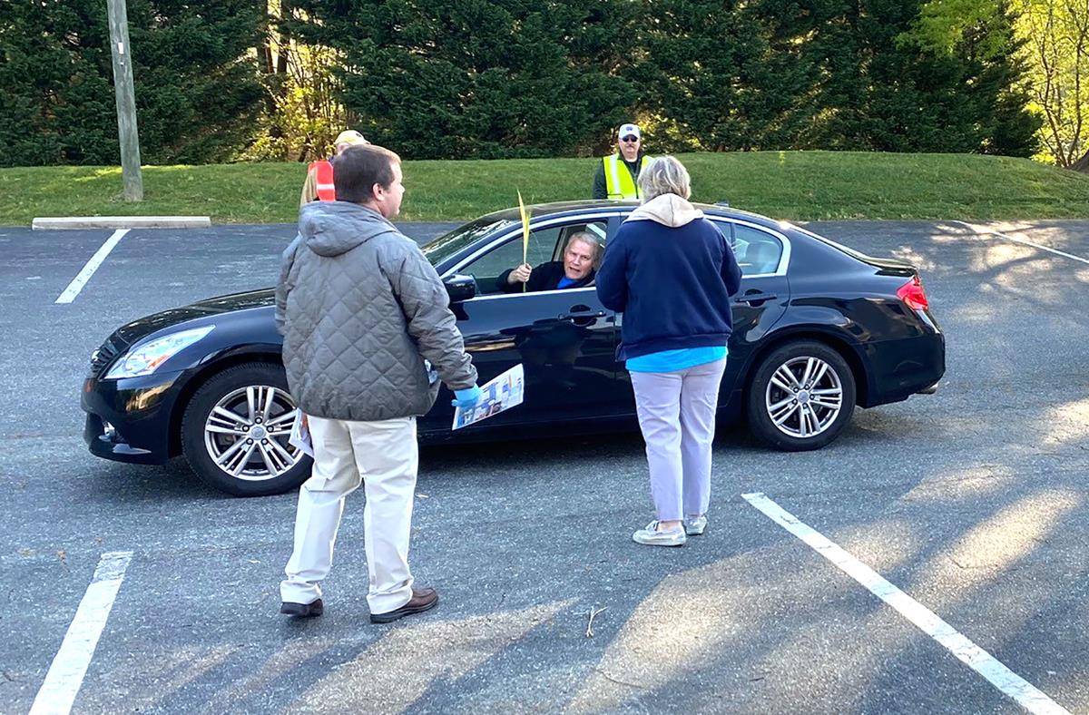 Like many parishes, St. Pius X in Greensboro handed out blessed palm branches in a “drive-through” for Palm Sunday April 5. (Photo provided)