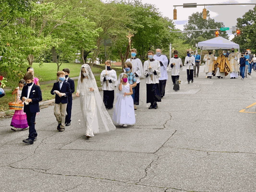 Parishioners at Our Lady of Grace Church in Greensboro took part in a Eucharistic Procession. (Photos by Barbara Markun)