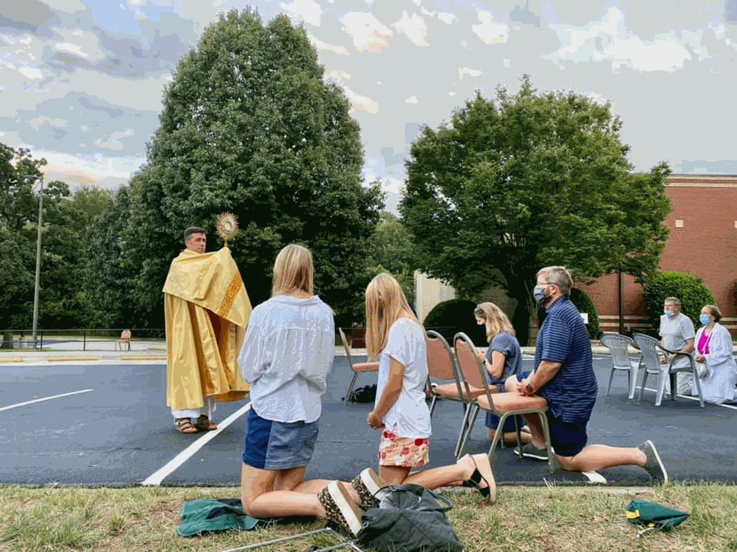 Outdoor Mass and Eucharistic Adoration at St. Gabriel Church in Charlotte. (Photo via Facebook)