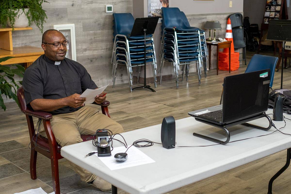 Father Basile Sede, pastor, speaks during a virtual workshop at Our Lady of Consolation Church’s parish-based Eucharistic Congress Sept. 11-13. The event’s recordings are posted on the parish’s website, www.ourladyofconsolation.org. (Travis Burton)