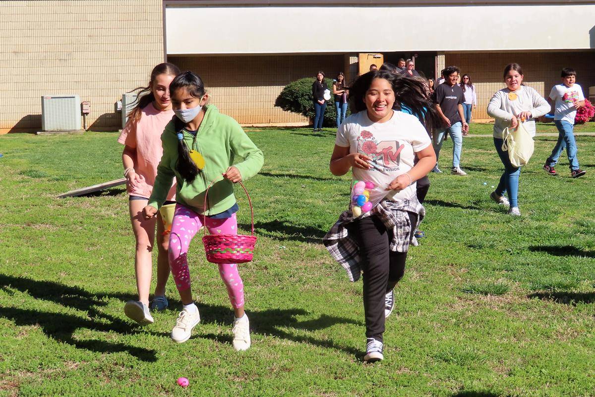 It was a beautiful sunny day with indoor activities including coloring, face painting and several games such as an egg spoon carry, and