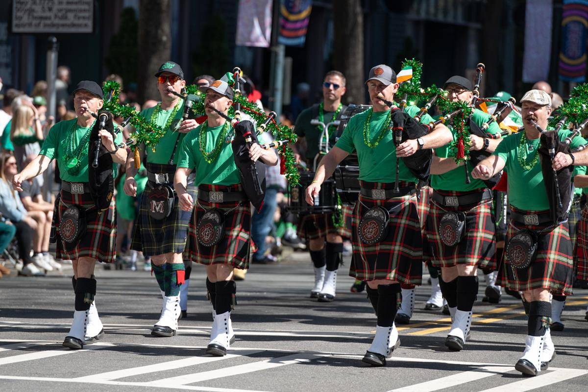 Students, staff and family of St. Patrick school march in the parade.