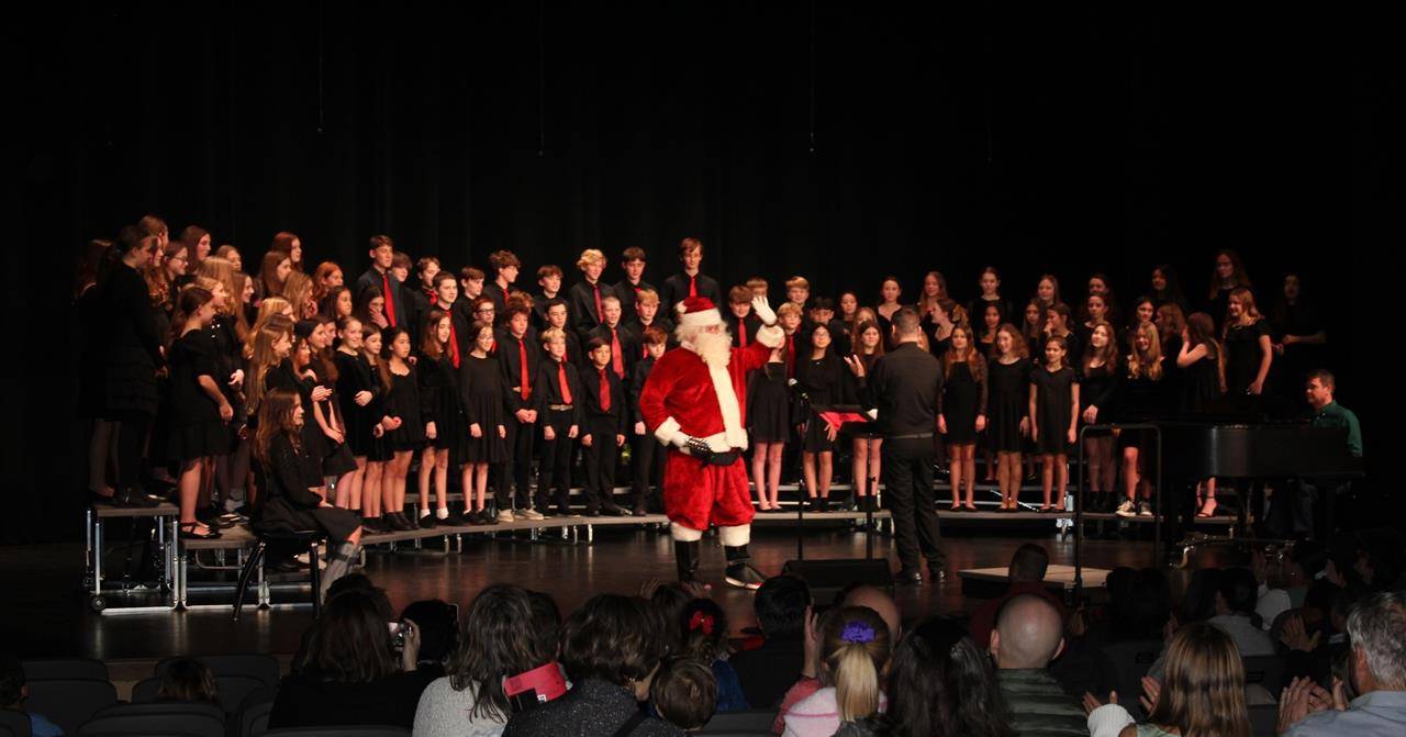 Holy Trinity Middle School students perform during a Choral concert.