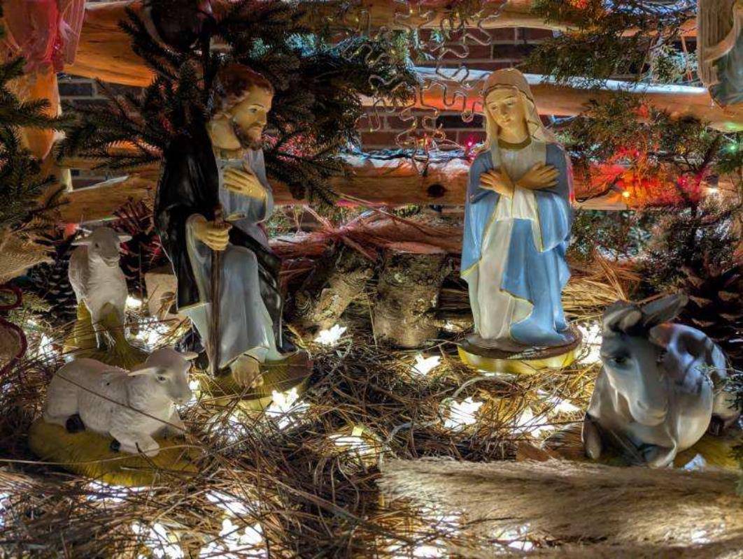 St. John Lee Korean in Charlotte is all ready for Christmas with a Nativity set out front, snowflakes on the walls, and wreaths on the doors.
