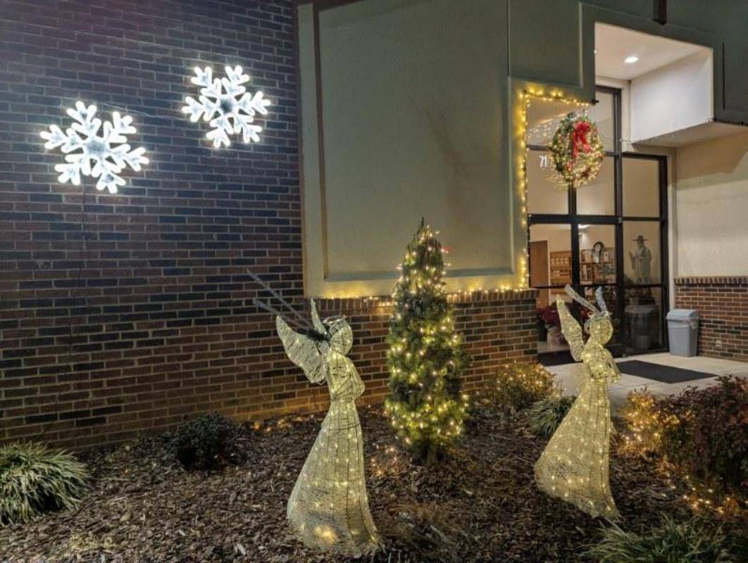 St. John Lee Korean in Charlotte is all ready for Christmas with a Nativity set out front, snowflakes on the walls, and wreaths on the doors.