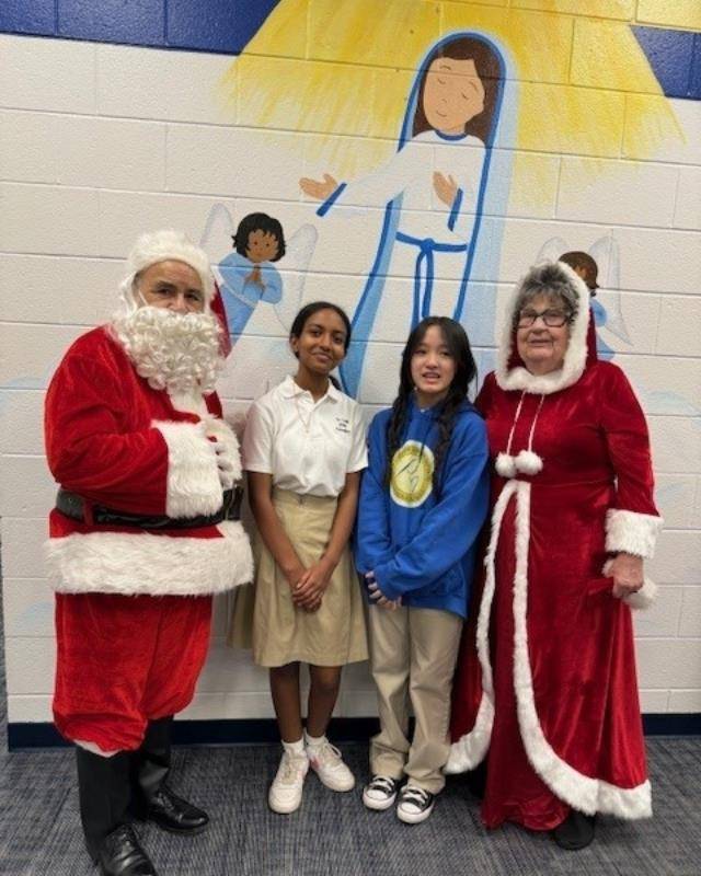 Santa and Mrs. Claus made a special stop at Our Lady of the Assumption School to spend time the students!