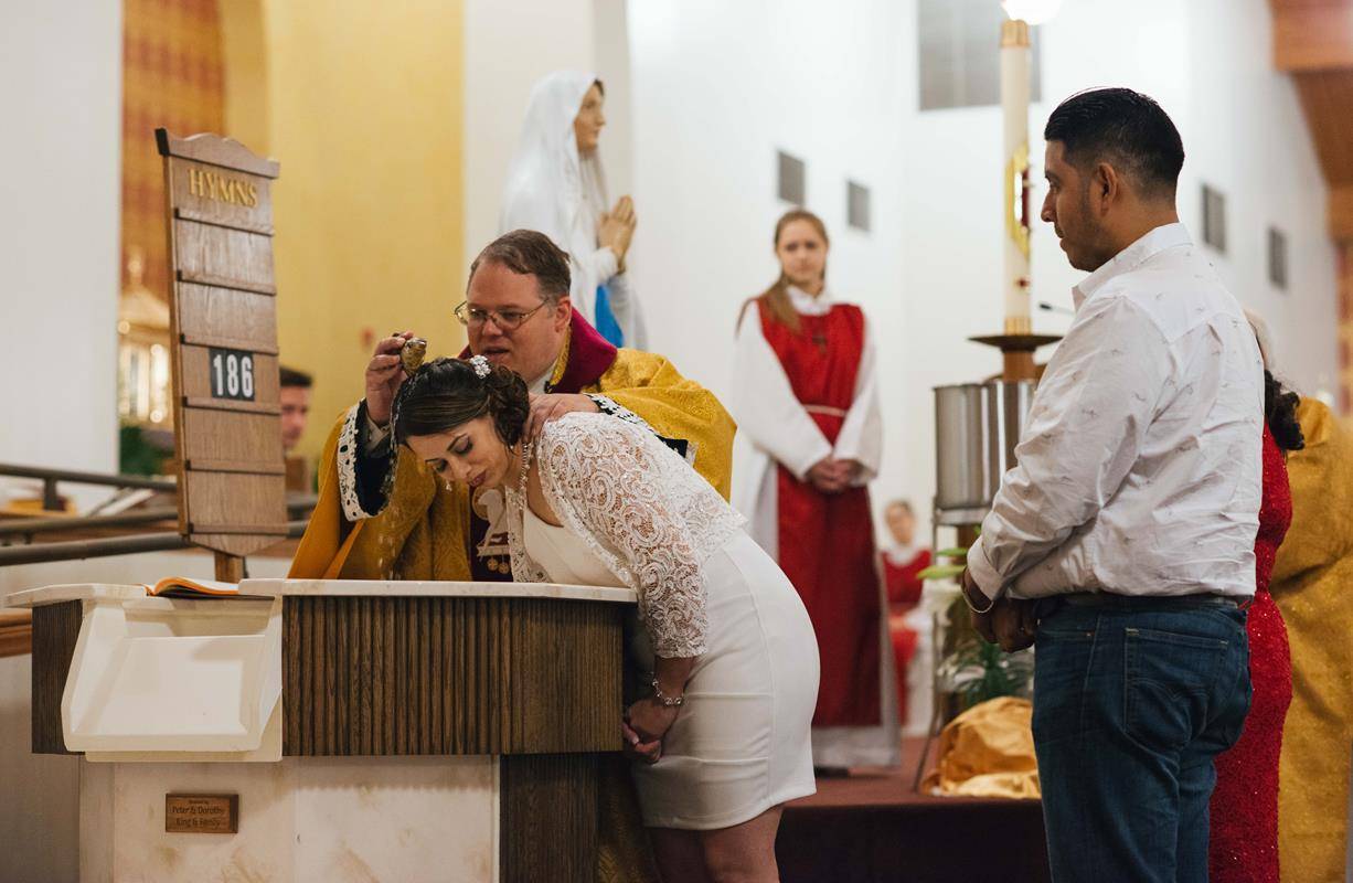 MONROE — Easter Vigil at Our Lady of Lourdes (By Tara Heilingoetter)