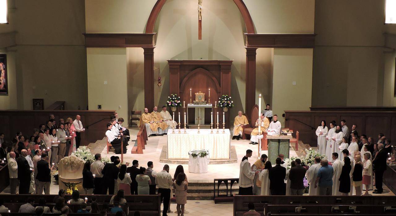 HUNTERSVILLE — Easter Vigil at St. Mark Church. (By Amy Burger)