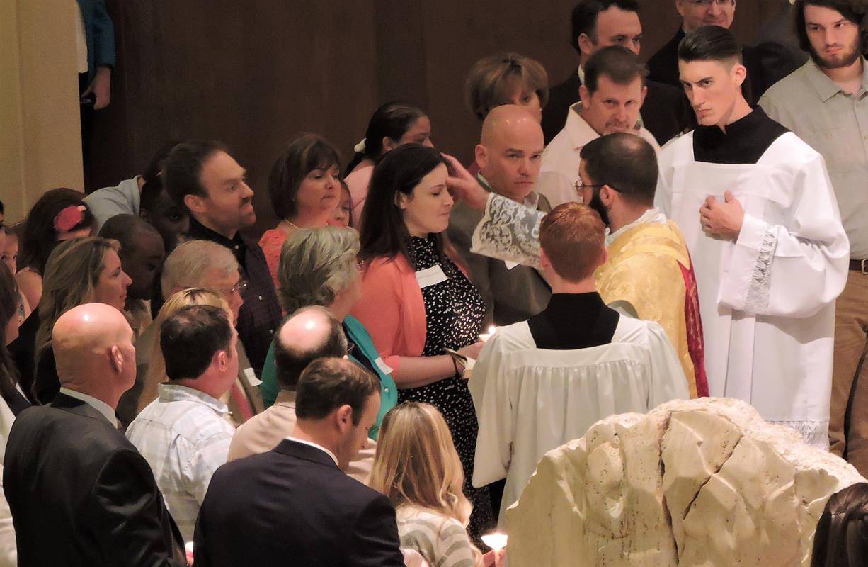 HUNTERSVILLE — Easter Vigil at St. Mark Church. (By Amy Burger)