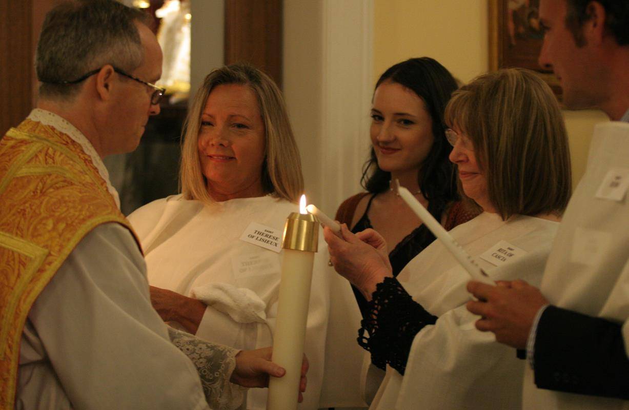 CHARLOTTE — Easter Vigil at St. Ann Church in Charlotte. (By SueAnn Howell)