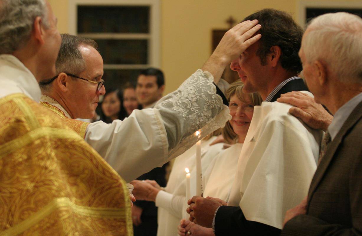 CHARLOTTE — Easter Vigil at St. Ann Church in Charlotte. (By SueAnn Howell)