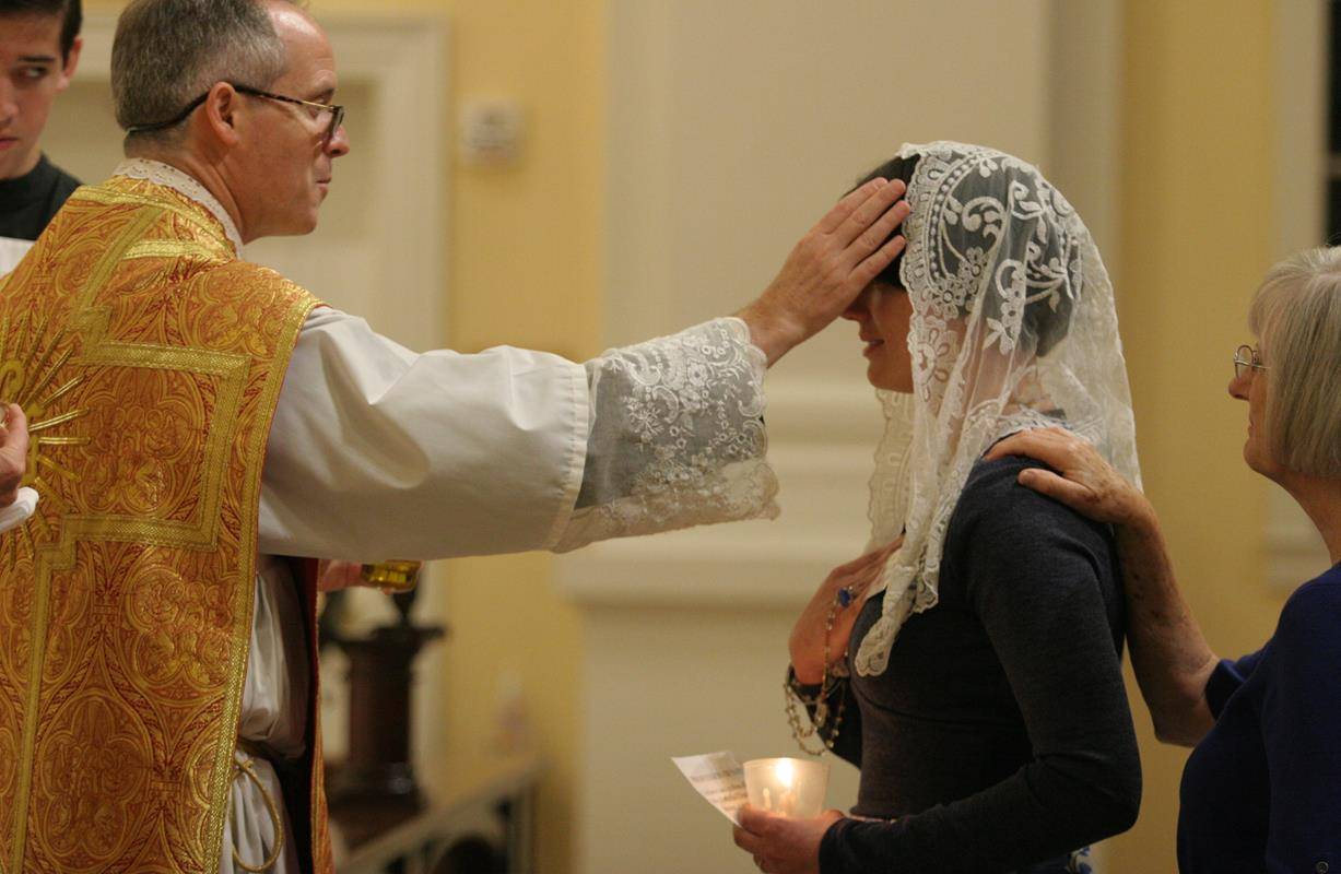 CHARLOTTE — Easter Vigil at St. Ann Church in Charlotte. (By SueAnn Howell)