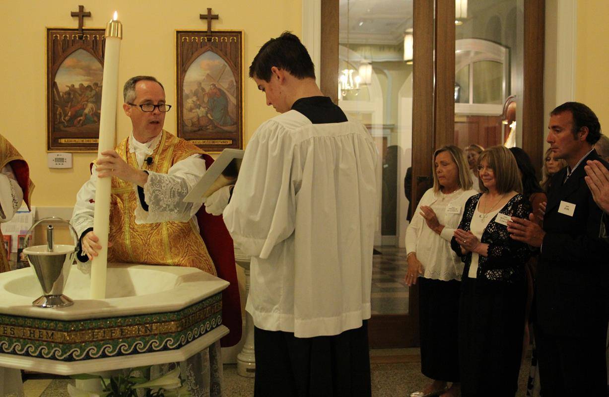 CHARLOTTE — Easter Vigil at St. Ann Church in Charlotte. (By SueAnn Howell)