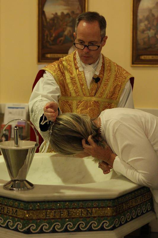 CHARLOTTE — Easter Vigil at St. Ann Church in Charlotte. (By SueAnn Howell)